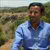 Dr. Mangesh Badere